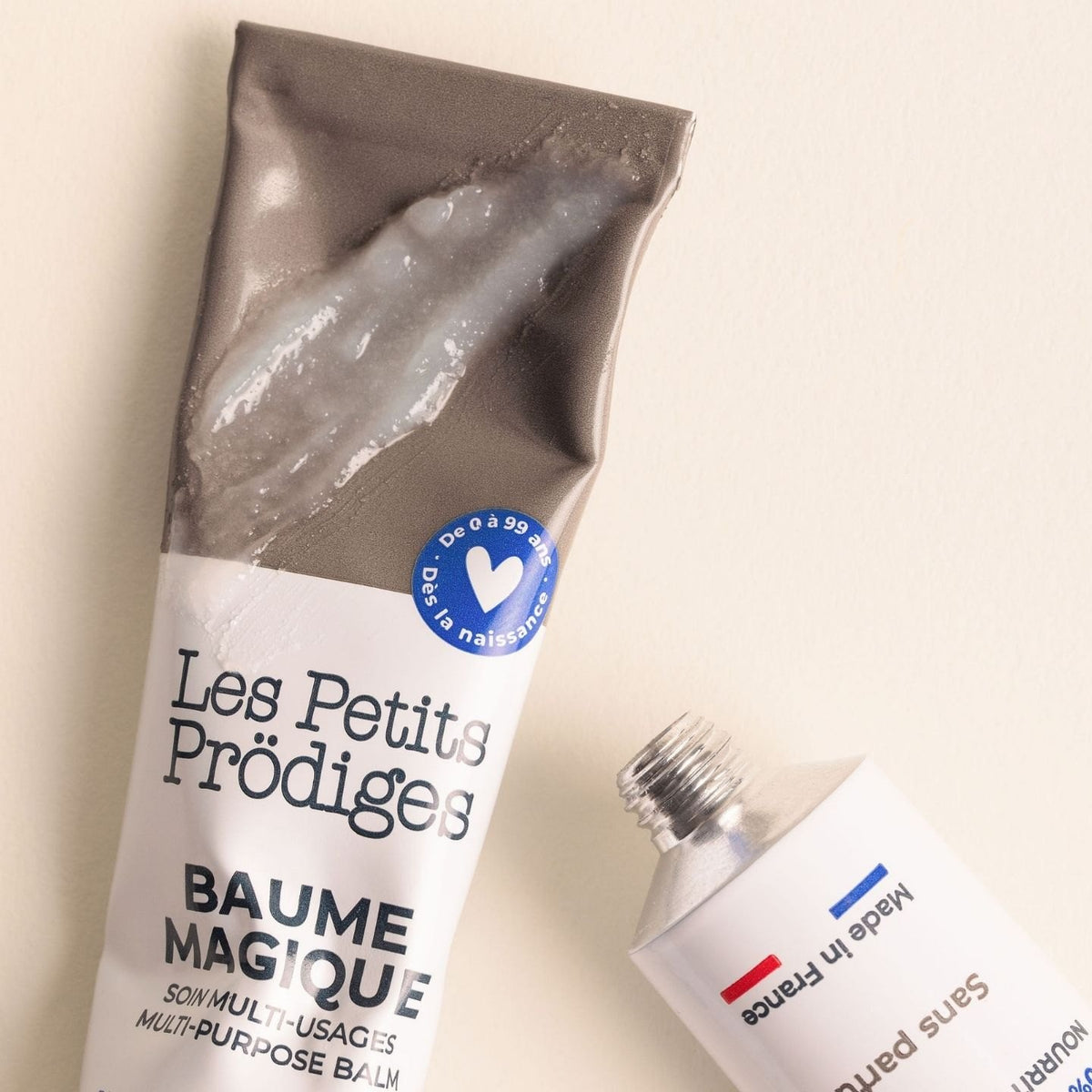 Tubes de Baume Magique Les Petits Prödiges, dont un ouvert avec sa texture