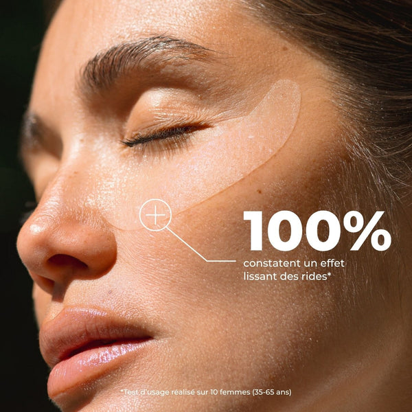 Femme les yeux fermés avec un patch sous l'œil, 100 % constatent un effet lissant des rides