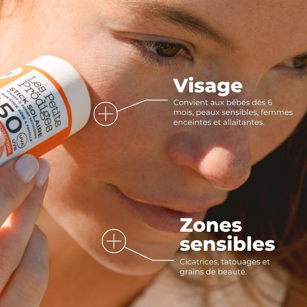 Femme appliquant le Stick Solaire SPF 50 sur le visage et les zones sensibles