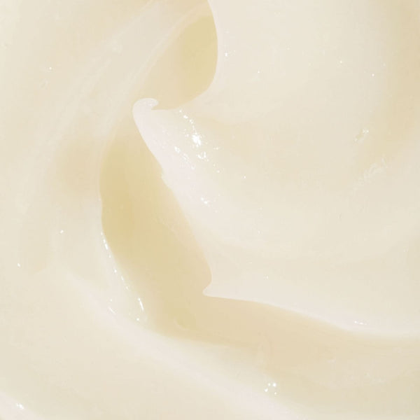 Gros plan de la texture fondante du Baume Magique