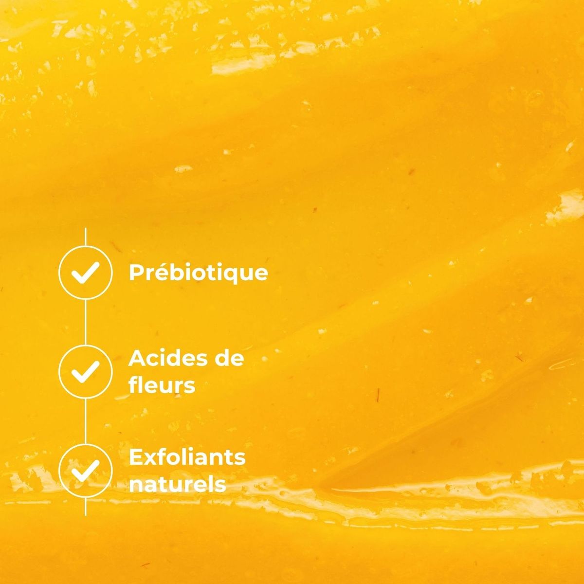 Texture ambrée du Masque Exfoliant Régénérant : prébiotique, acides de fleurs, exfoliants naturels